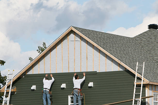 Professional Siding Contractor technician working in Evans City, PA